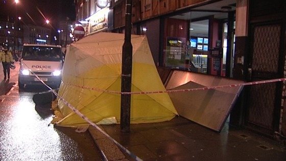 Parts of the sign remained on the ground outside the William Hill store