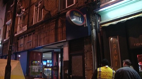 A large portion of the shop frontage can be seen missing