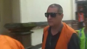 Julian Ponder arrives at court in Bali. 