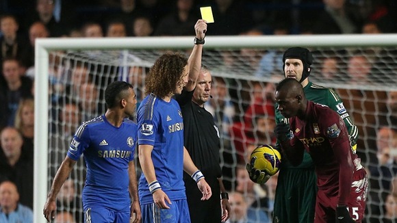 Balotelli booked for simulation during a clash with Chelsea