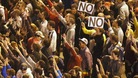 Protesters shout slogans during a demonstration outside Madrid's Parliament in September 2012