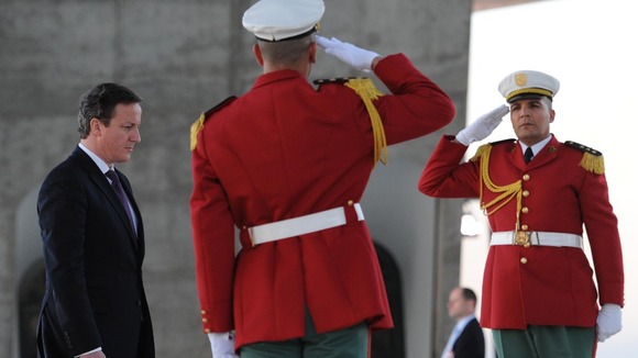 David Cameron visits the Monument des Martyrs on his arrival in Algiers, Algeria