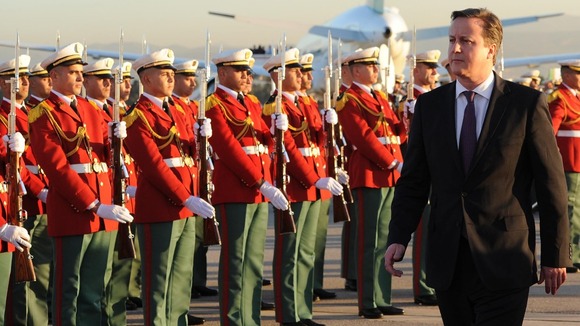 David Cameron visits the Monument des Martyrs on his arrival in Algiers, Algeria, with Algerian Energy Minister Yousfi