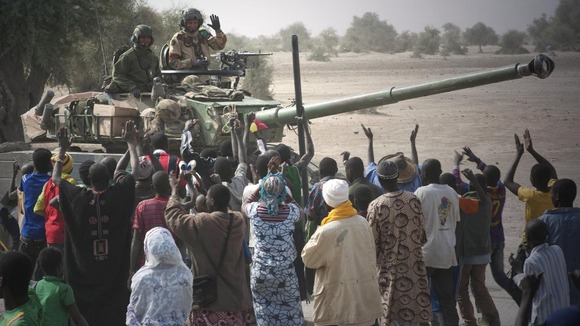 French troops are greeted by Malian as they arrive in Timbuktu