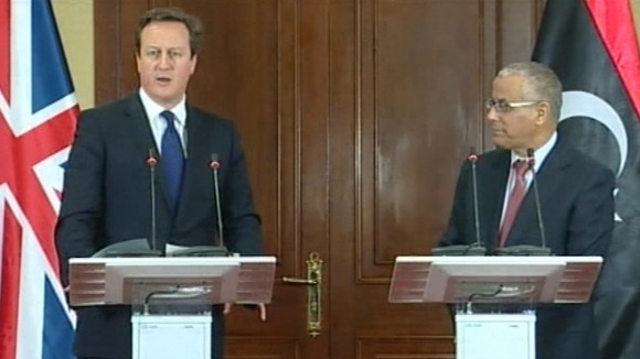 David Cameron at the press conference in Libya