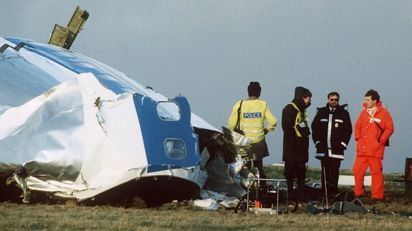 December 1988: Rescue workers and investigators search the area around the cockpit of Pan Am flight 103