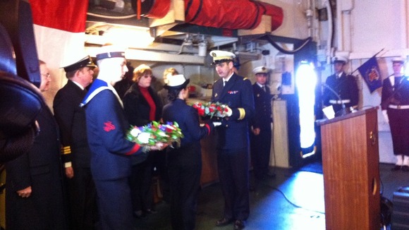 Wreaths are exchanged on board Primauguet
