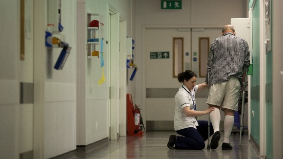 A patient helped by a nurse at Guys Hospital in London in 2011.