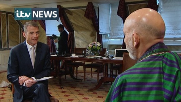 Bill Neely with Hamid Karzai in a joint interview with the Guardian
