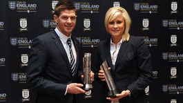 England's Steven Gerrard (left) and Stephanie Houghton with their respective Senior Men's and Women's Player of the Year Awards.