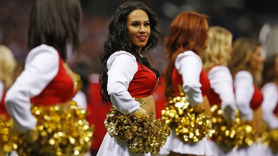 San Francisco 49ers cheerleaders look on while their team plays the Baltimore Ravens.