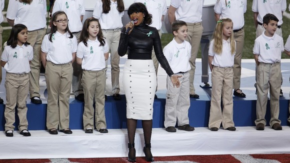 Singer Jennifer Hudson performs "America the Beautiful" with The Sandy Hook Elementary School Choir.