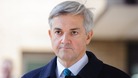 Chris Huhne leaving court today