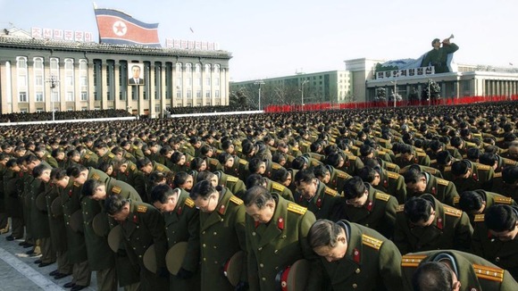 North Koreans gather during a memorial for the late North Korean leader Kim Jong-il, in 2011.