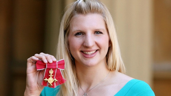 Rebecca Adlington with the OBE she received in 2009