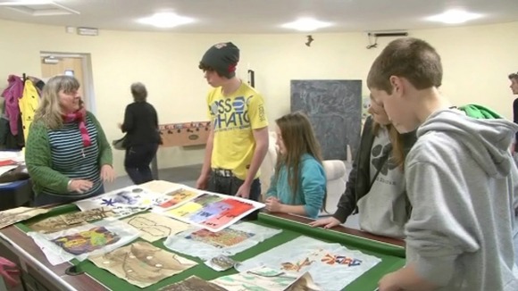 Children creating artwork at Wigmore youth club.