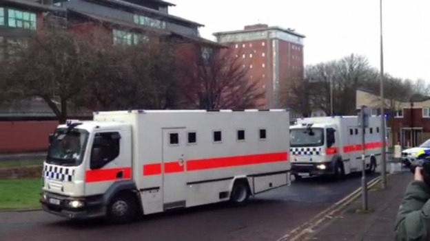Police vans thought to be carrying at least one of the defendants in the Dale Cregan trial arrive at Preston Crown Court.