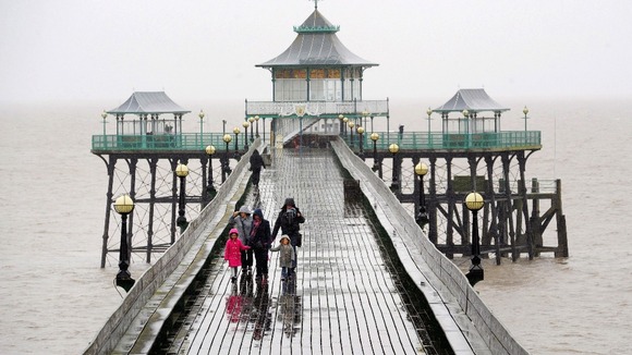 People on the Victorian Pier at Clevedon, Somerset.