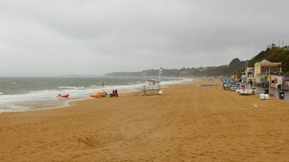 An almost deserted Bournemouth beach on a wet Bank Holiday Monday.