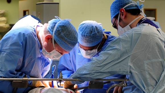 It takes several surgeons to perform an organ transplant