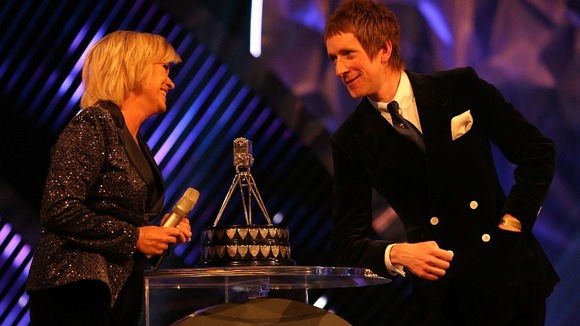Bradley Wiggins chats to Sue Barker on stage during the Sports Personality of the Year Awards 2012,