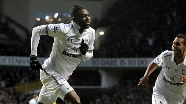 Tottenham Hotspur's Emmanuel Adebayor (left) celebrates with team-mate Kyle Naughton after scoring his side's second goal of the game