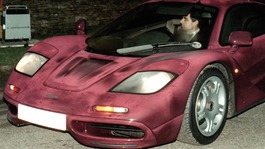 File photo: Rowan Atkinson driving his McLaren F1 supercar before the crash