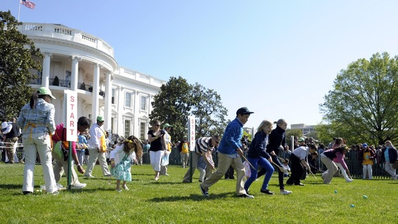 Children participate in the annual White House Easter Egg Roll on the South Lawn of the White House in Washington.