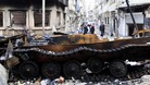 A damaged armoured vehicle belonging to the Syrian army