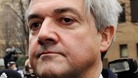 Chris Huhne leaving court