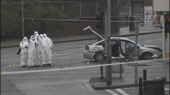 Forensic experts at the scene of the collision in Londonderry, Northern Ireland