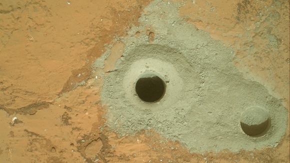 the hole in a rock called "John Klein" where the rover conducted its first sample drilling on Mars