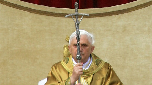 German Pope Benedict XVI holds his pastoral staff as he arrives to lead his first public mass in 2005.