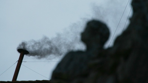 Black smoke rising from the chimney above the Sistine Chapel in 2005