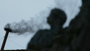 Black smoke rising from the chimney above the Sistine Chapel in 2005
