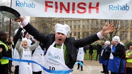 Conservative MP Tim Loughton crosses the finishing line victorious.