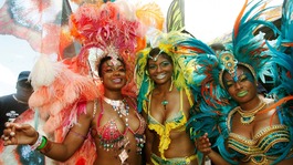 American actress Tatyana Ali (L) with her sisters on the final day of the Trinidad and Tobago Carnival