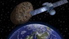 Artist's impression shows how the 'near-miss' asteroid might look passing in-between Earth and its communication satellites 