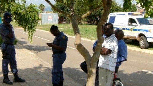 Police outside Oscar Pistorius' home
