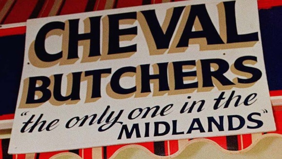 A butcher in 1996 advertising horsemeat in the Midlands.