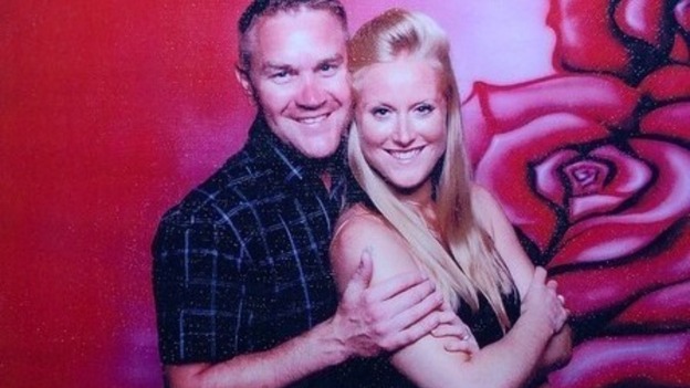 Couple on red rose background