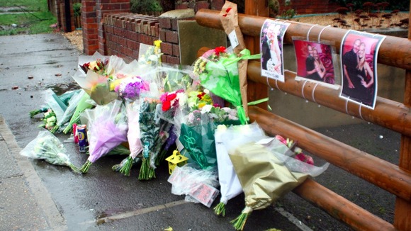 Flowers on pavement
