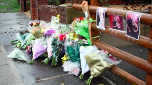 Flowers on pavement