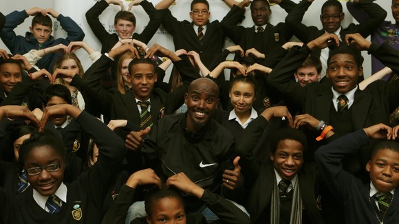 Mo Farah with school children from Lords Wood Lower Boys and Girls school