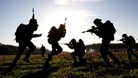 Soldiers from The Territorial Army London Regiment during a compound clearance exercise at Wretham Camp training area in Thetford, Norfolk.