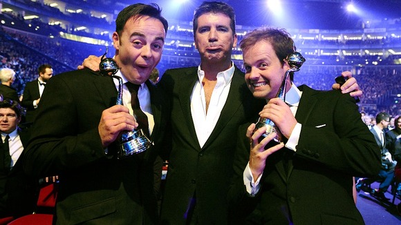 The trio are pictured together at the 2010 National Television Awards.