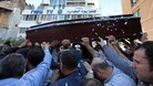 Mourners carry the coffin of Lebanese television cameraman Ali Shaaban who was shot dead on the Lebanon-Syria border on Monday. 