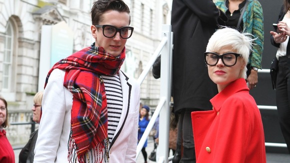 Fashionistas attend the London show.
