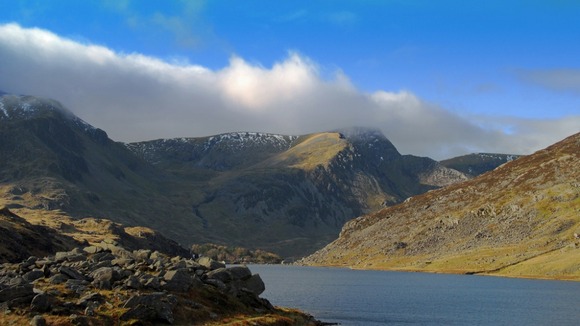 Cloud billows over the mountains