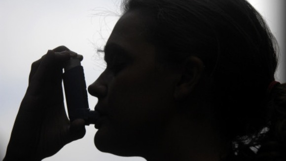 Woman with inhaler